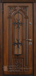 Фото «Дверь с ковкой №7»  в Долгопрудному